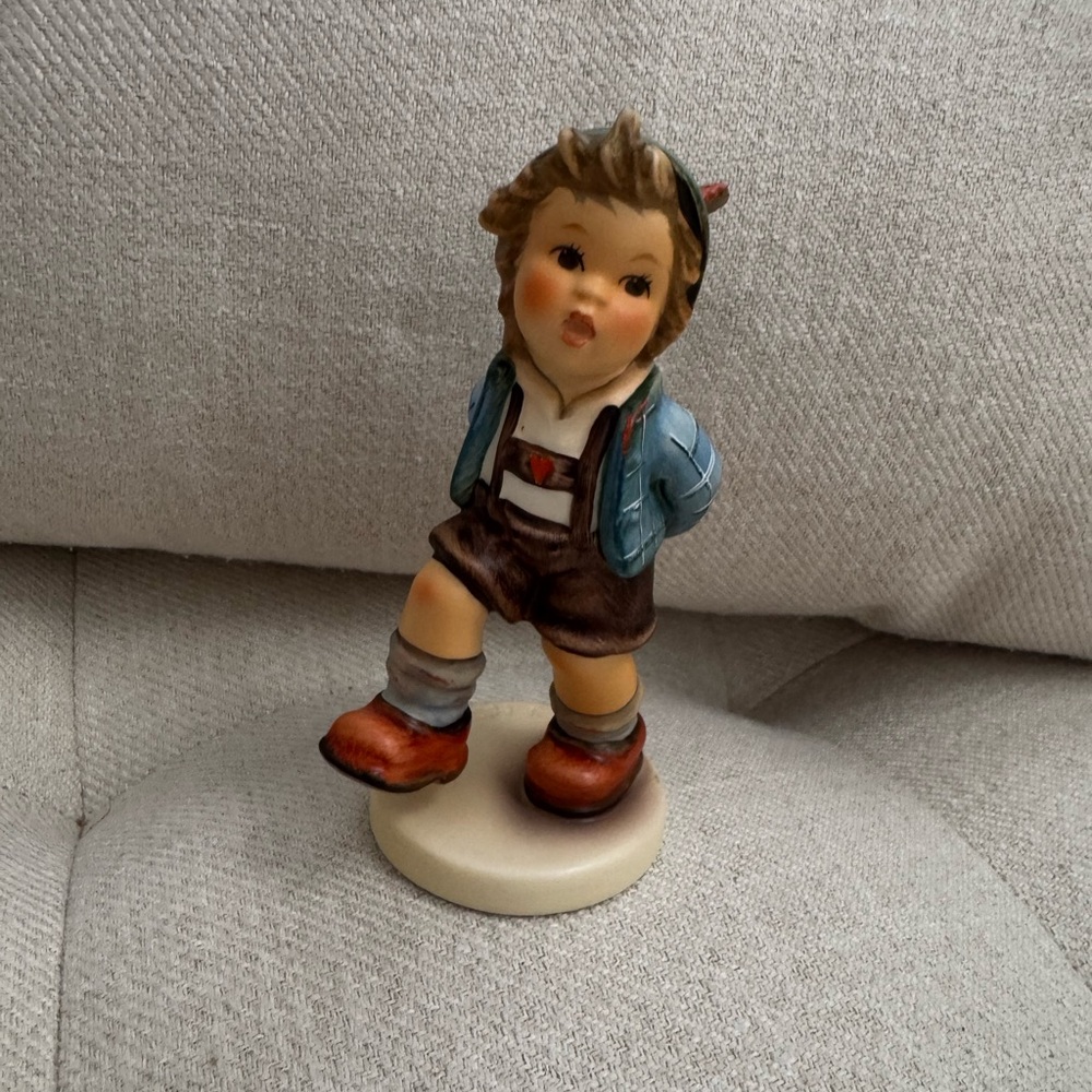 Charming Boy Figurine with Blue Jacket